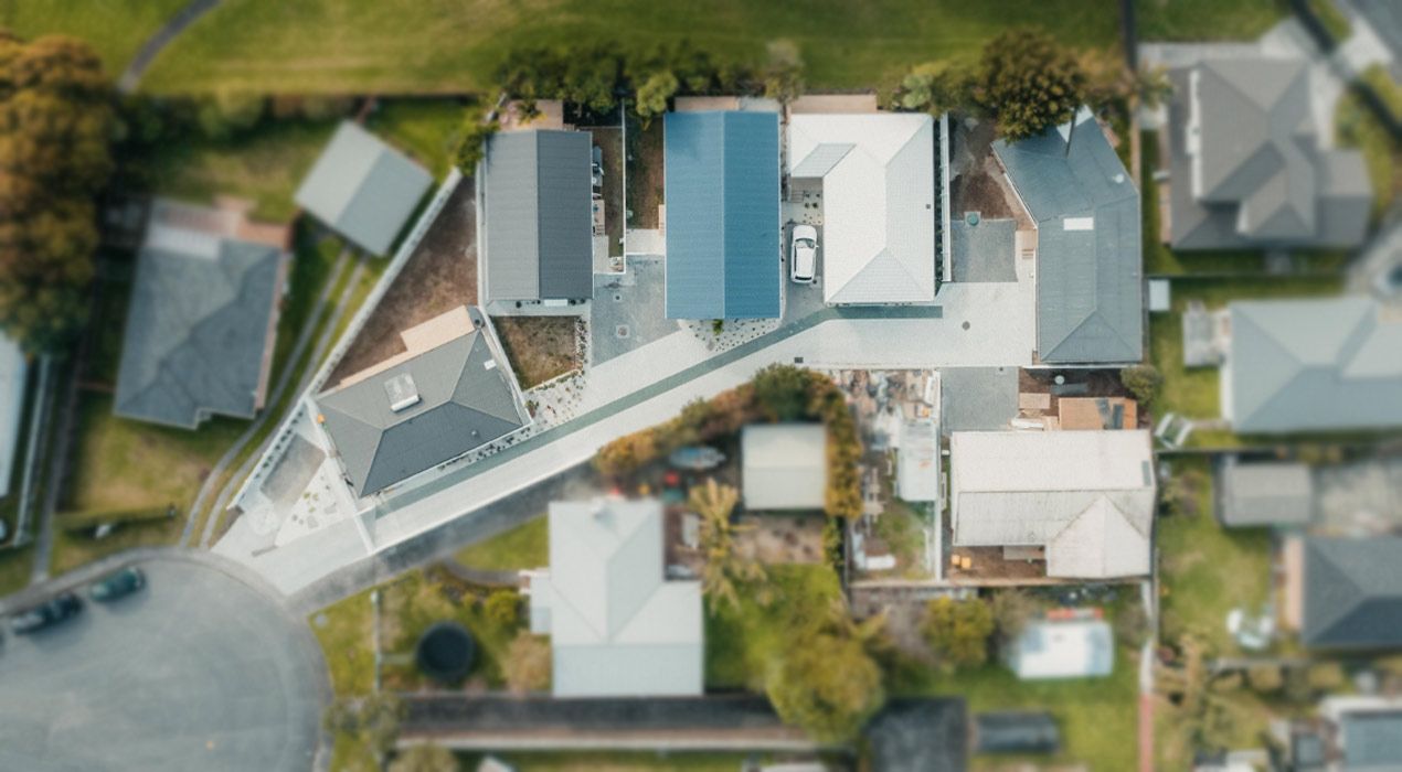 Aerial view of the homes at Clinton Cove—on Clinton Ave in Te Atatu, Auckland