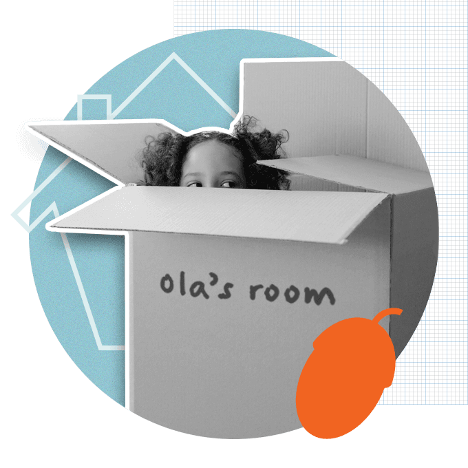 kid peering out of a box that she is sitting in. 'Ola's room' is on the front of the box