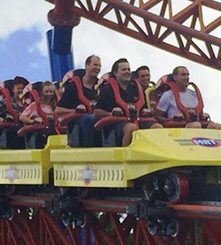 Group of squirrel team sitting on rollercoaster