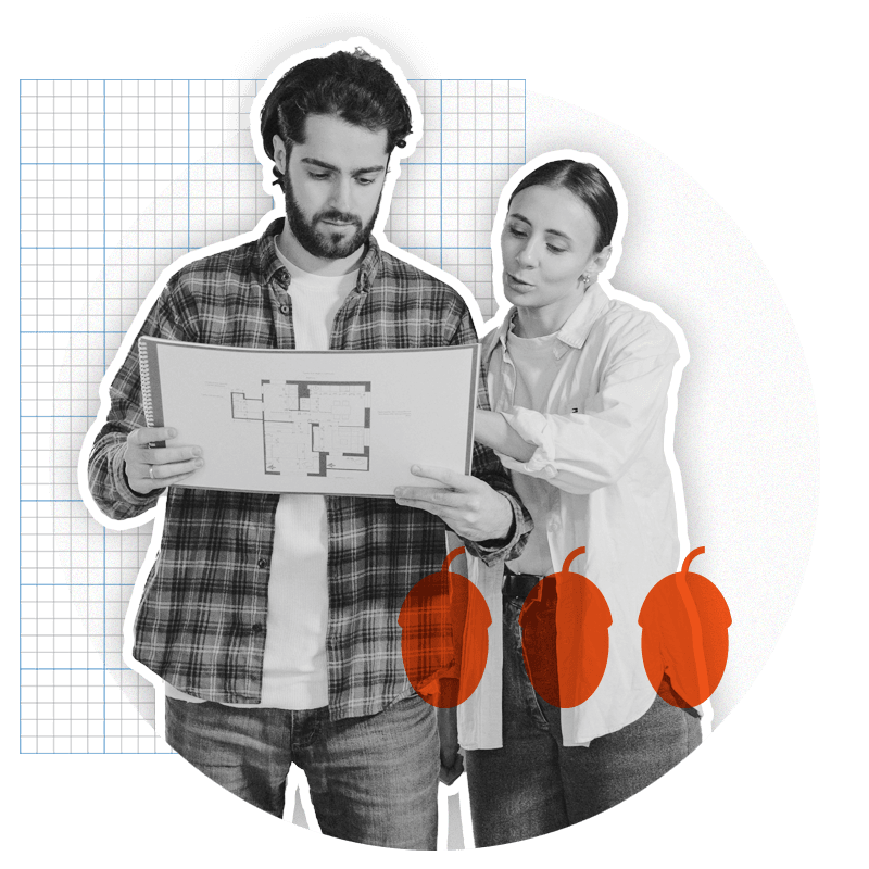 Young man and woman looking at property plans