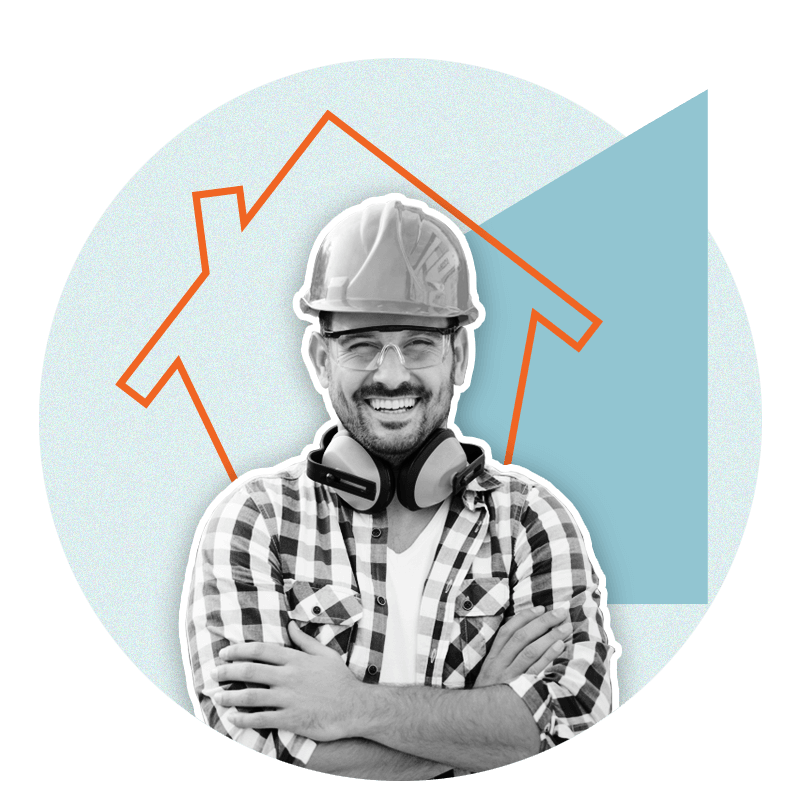 Builder wearing hard hat, smiling