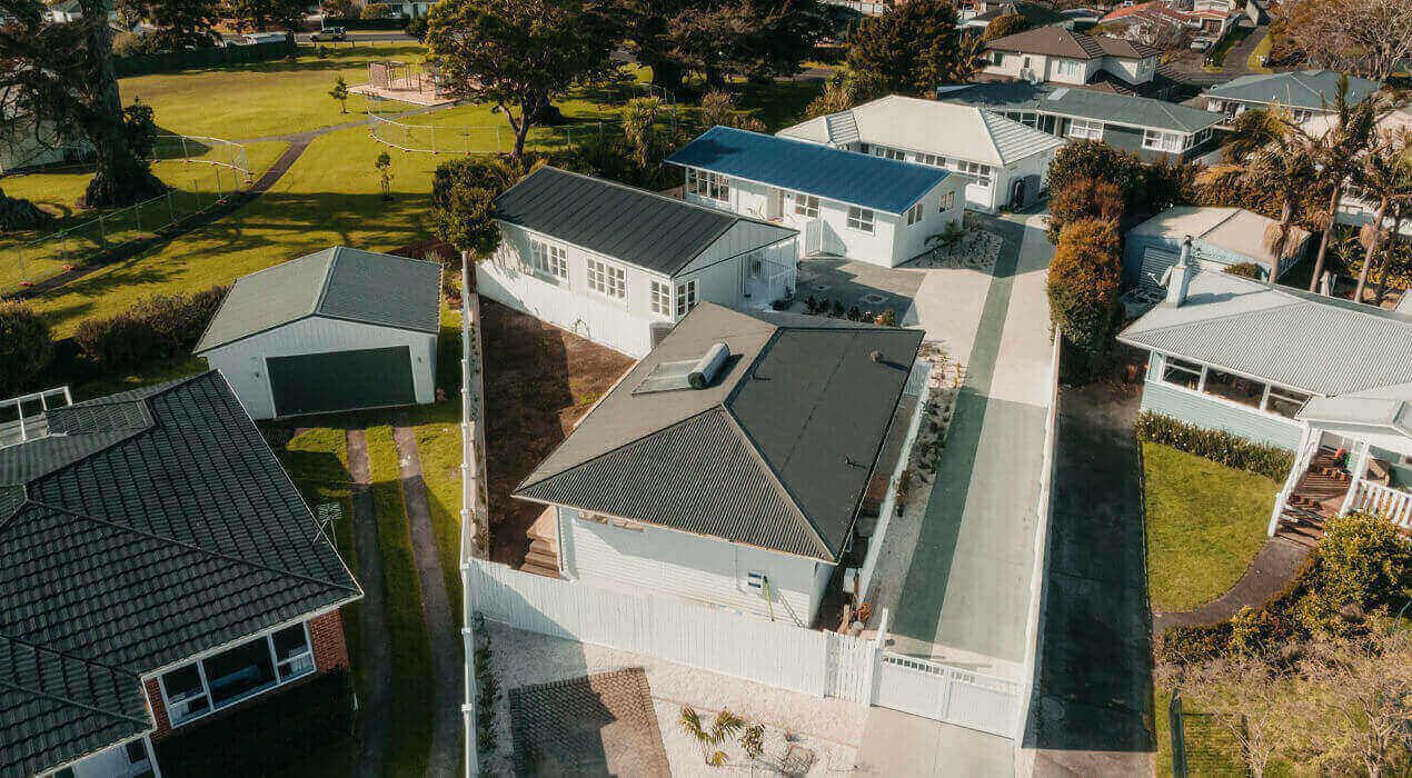 Aerial view of properties located at Clinton Cove, on Clinton Ave in Te Atatū, Auckland